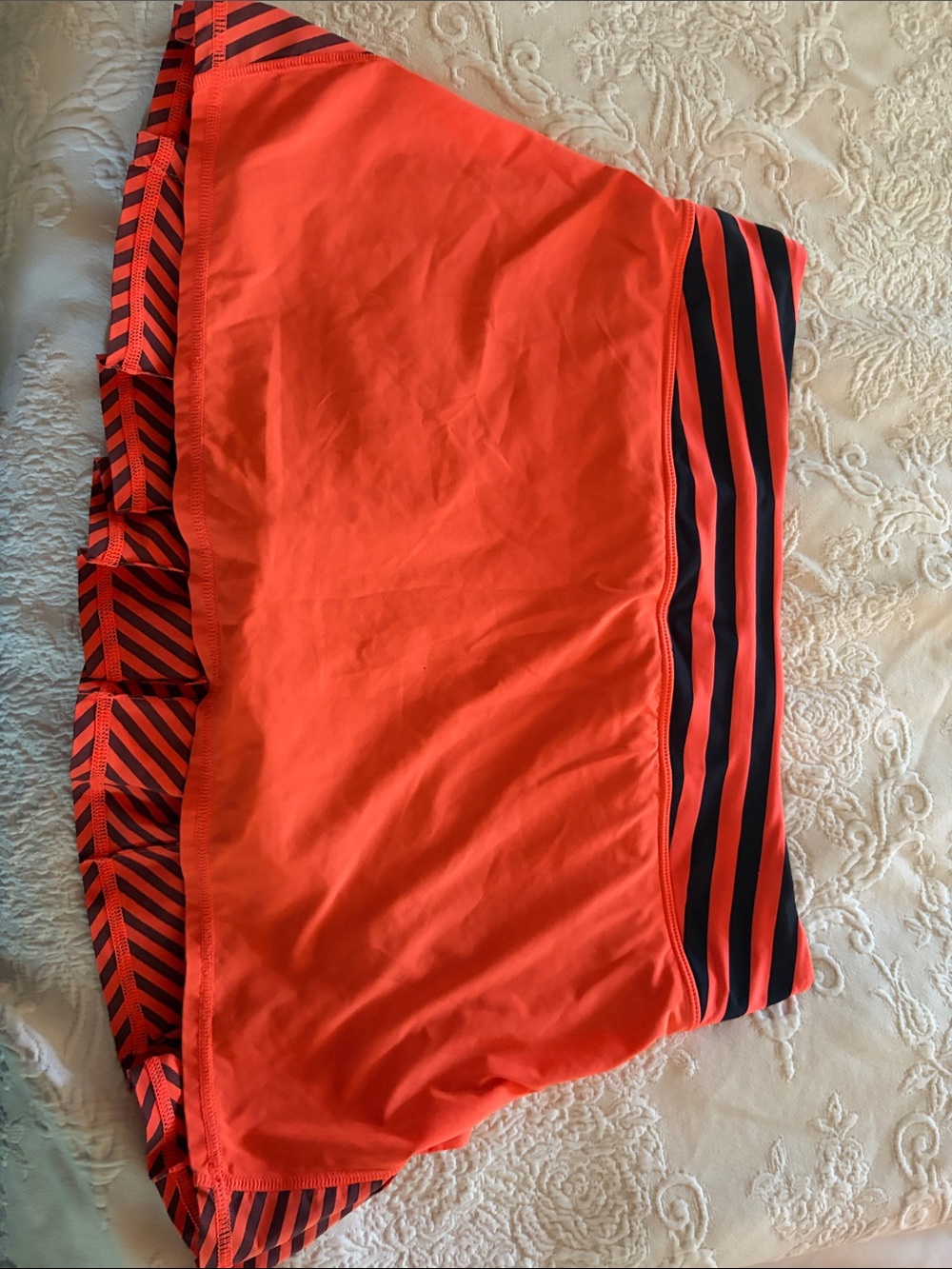 Lululemon Orange Skort with Navy Stripe Detail